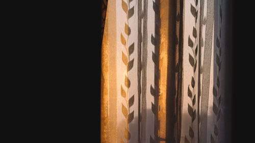 Close-up of paper against black background