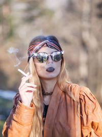 Young woman wearing sunglasses