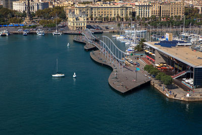 High angle view of boats moored at harbor