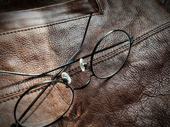 High angle view of eyeglasses on cable
