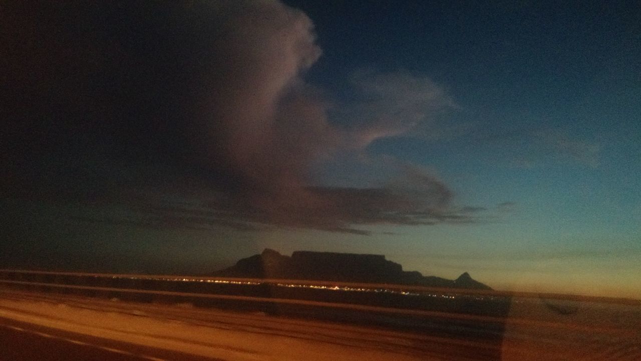 SILHOUETTE OF PERSON AGAINST SKY AT NIGHT