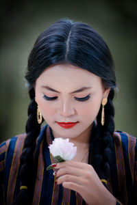 Portrait of young woman with eyes closed