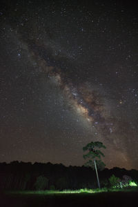 Scenic view of star field against sky at night