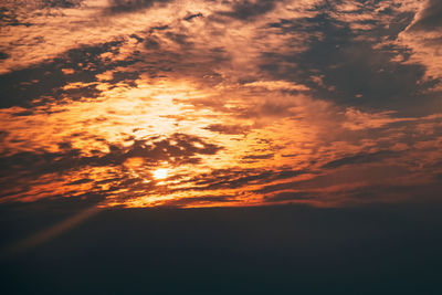 Low angle view of dramatic sky during sunset