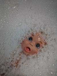 Close-up high angle view of bubbles in water