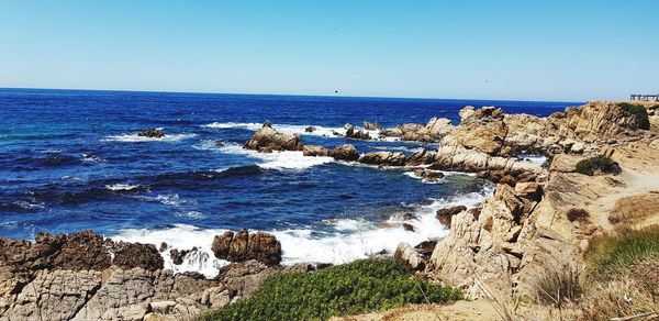 Scenic view of sea against clear sky