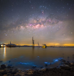 Scenic view of sea against sky at night