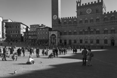 Group of people in front of historical building