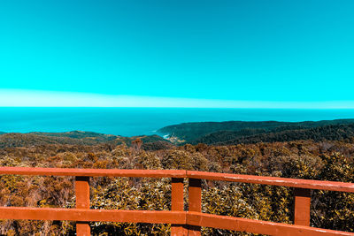 Scenic view of landscape against blue sky