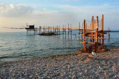 Pier on sea against sky