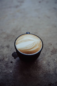 Close-up of cappuccino on table