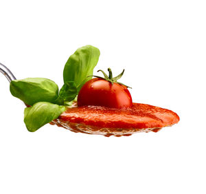 Close-up of red chili pepper against white background