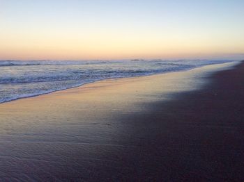 Scenic view of sea at sunset