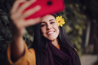 Portrait of smiling young woman