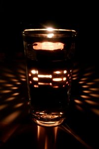 Close-up of tea light candle on table