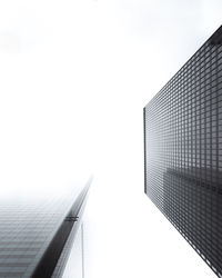 Low angle view of modern buildings against clear sky