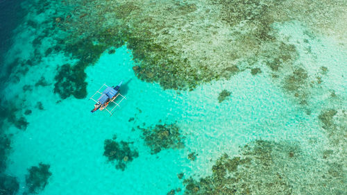 Sea water surface in lagoon with coral reef copy space for text. 