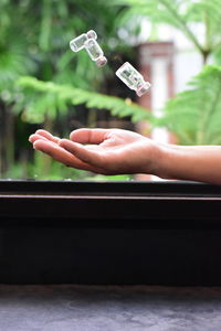 Close-up of person holding hands