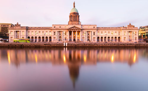 Reflection of building in river