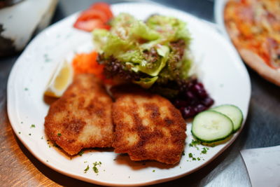 Close-up of meal served in plate on table