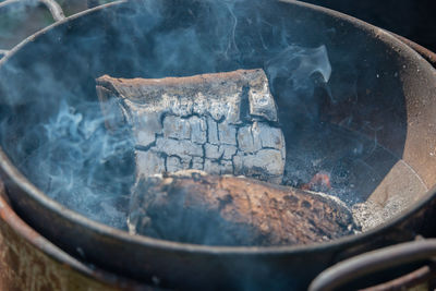 Close-up of wood in fire pit