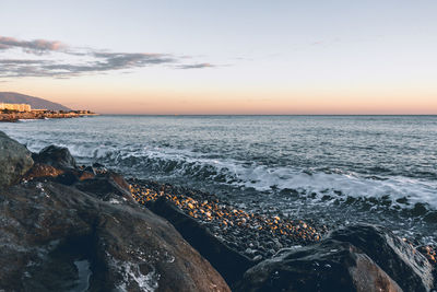 Scenic view of sea against sky during sunset