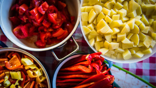 High angle view of chopped vegetables in bowl on table