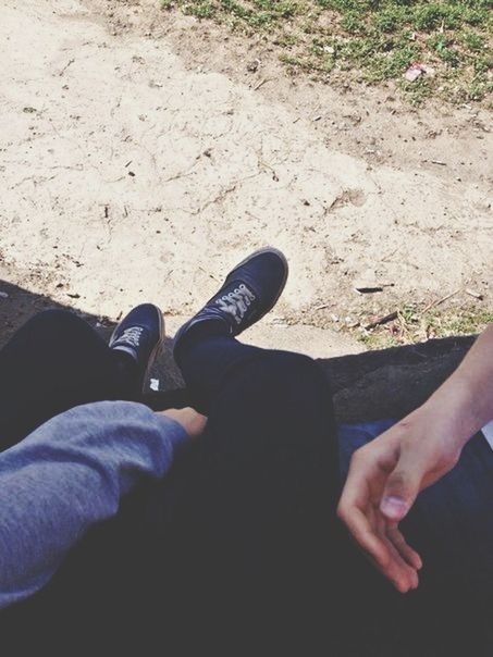 low section, person, personal perspective, lifestyles, leisure activity, shoe, high angle view, men, human foot, standing, unrecognizable person, field, part of, jeans, day, outdoors