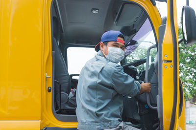 Man sitting in bus