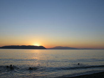 Scenic view of sea at sunset