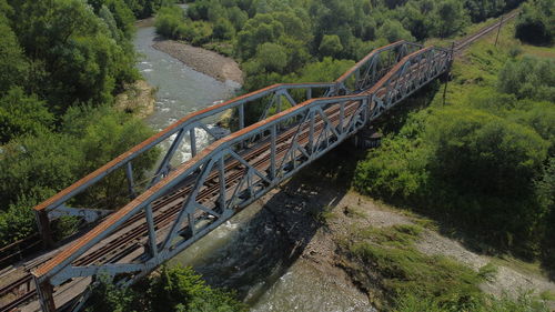 High angle view of bridge over forest