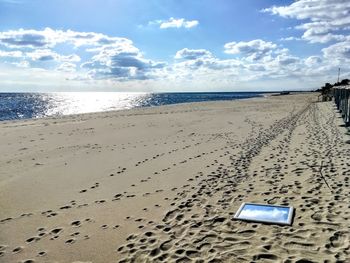 Scenic view of beach against sky