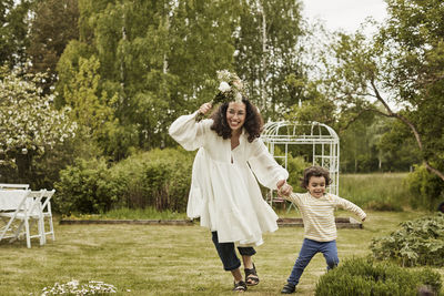 Mother with son in garden