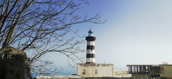 Low angle view of lighthouse against sky