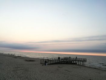 View of beach at sunset