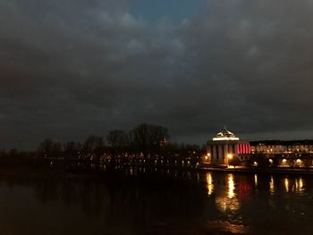 Illuminated city at waterfront