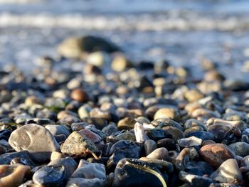 Close-up of stones on beach