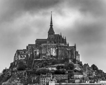 Mont saint micel. low angle view of historic building against sky