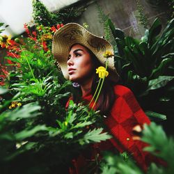 Portrait of young woman looking away