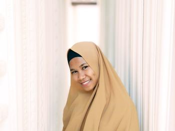 Portrait of smiling young woman