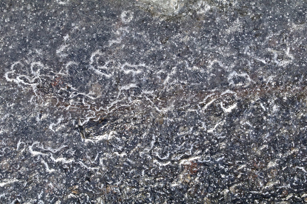 FULL FRAME SHOT OF ROCKS WITH ROCK