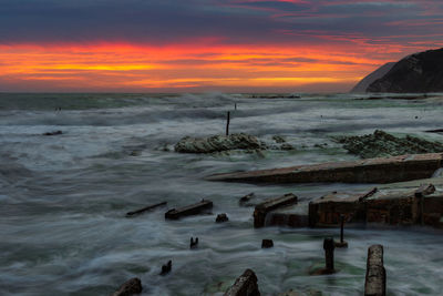 Scenic view of sea against sky during sunset