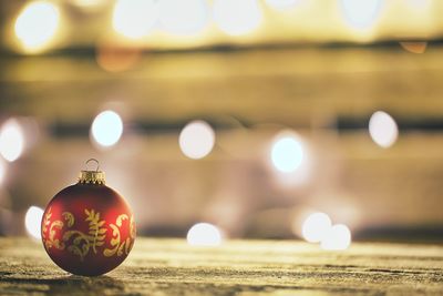 Close-up of illuminated christmas lights on table