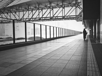 Full length of woman walking on walkway