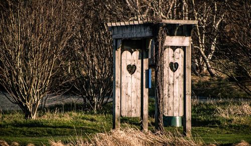 Old wooden door on field