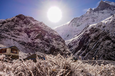 Scenic view of snowcapped mountains against sky