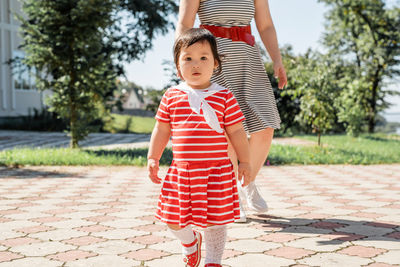 Multiethnic family. happy multiracial family of mother and daughter walking in the park