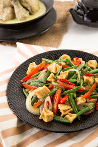 High angle view of vegetables in plate