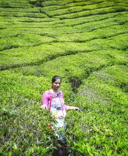 Full length of woman on field