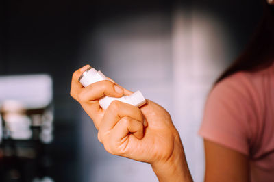 Close-up of man holding hands